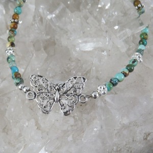 Pulsera mariposa turquesa y plata