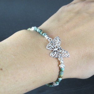 Pulsera mariposa turquesa y plata