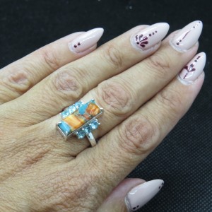 Anillo nácar con turquesa cobre y topacios y plata