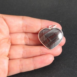 Colgante corazón ojo de hierro y plata