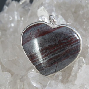 Colgante corazón ojo de hierro y plata