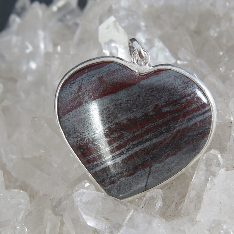 Colgante corazón ojo de hierro y plata