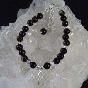 Pulsera obsidiana dorada y plata